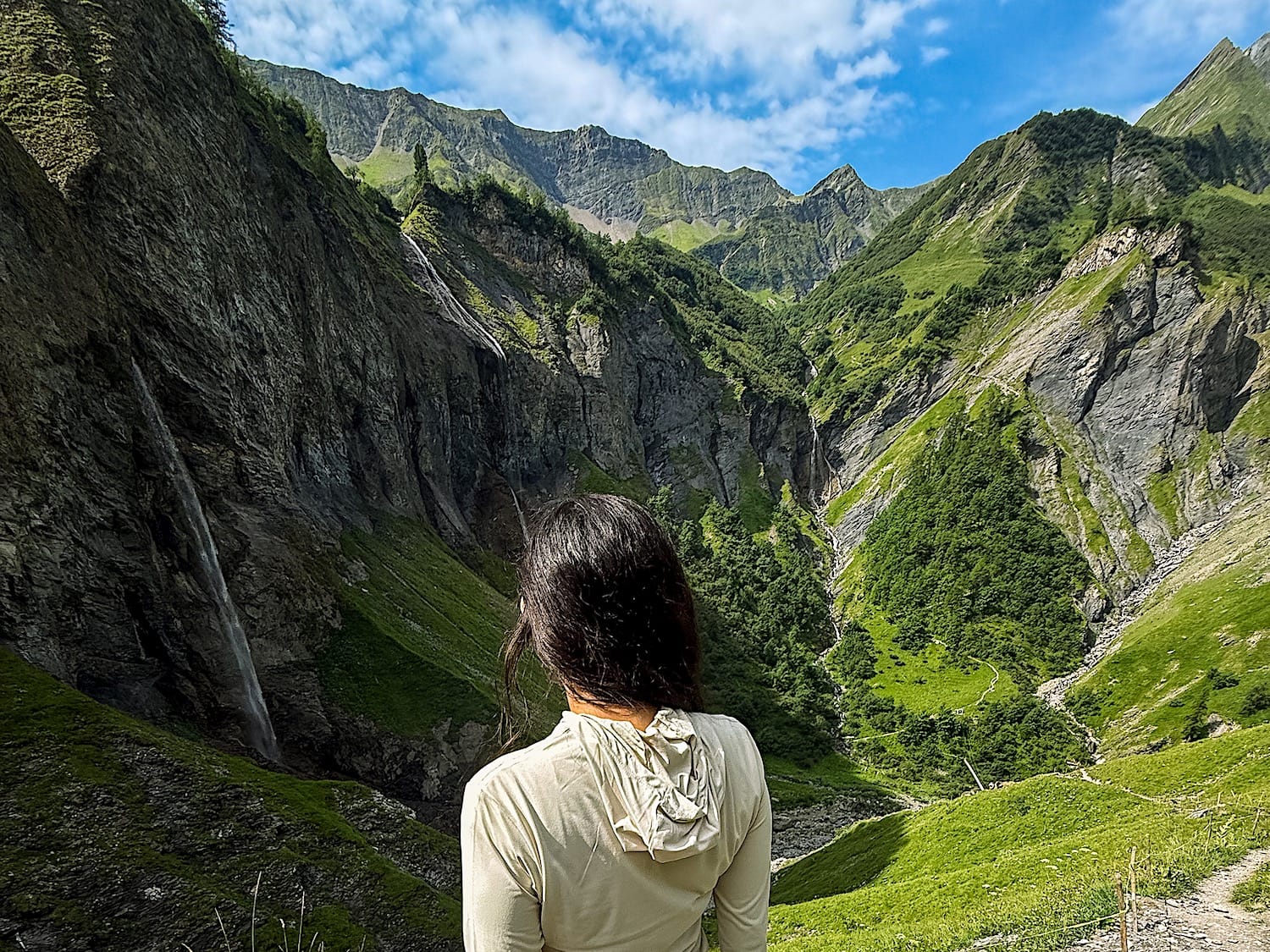 The waterfalls of the Waterfall-Arena Batöni dropping down the cliff above Weisstannen