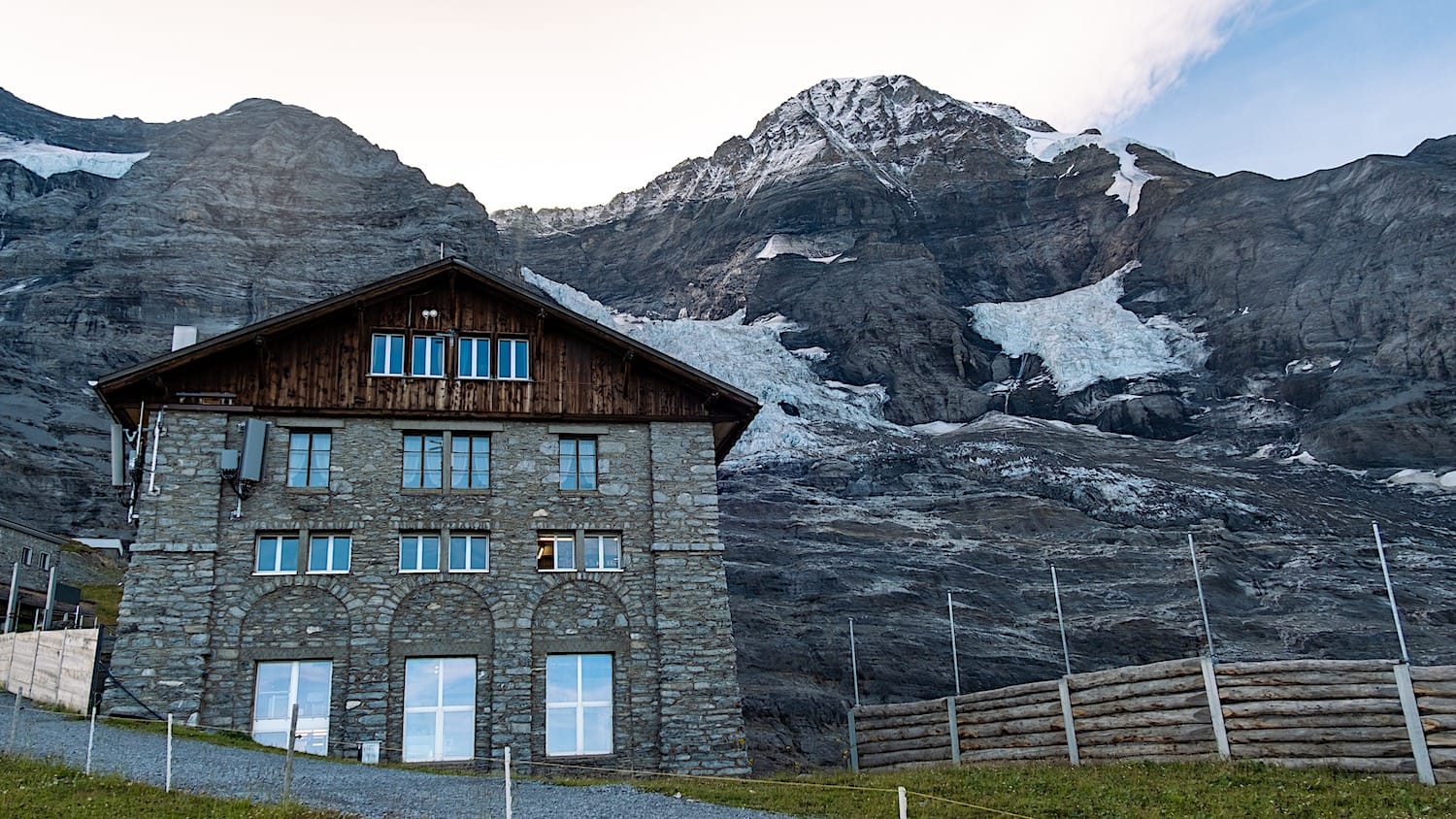 Eigergletscher cable car station building on the mountain with the Eiger behind
